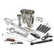 A Barfly stainless steel cocktail kit on a counter with silver containers and tools.