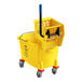 A yellow Lavex mop bucket with a handle and wheels.