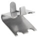 A close-up of a True Refrigeration shelf clip.