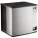 A silver and black Manitowoc Indigo NXT air cooled ice machine with a close-up of a vent.