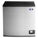 A silver and black rectangular Manitowoc Indigo NXT ice machine with a black lid.