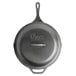 A close-up of a Lodge cast iron skillet with the word "bon" on the bottom.