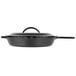A Lodge black cast iron skillet with a handle and lid.