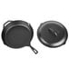 A close-up of a Lodge black cast iron skillet with cover.