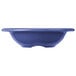 A close-up of a Carlisle Ocean Blue rimmed melamine fruit bowl.