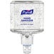 A Purell hand sanitizer dispenser on a wall.