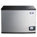 A silver and black Manitowoc Indigo NXT water cooled ice machine.
