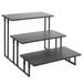 A black metal rectangular 3-tier American Metalcraft riser stand.