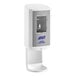 A white and silver Purell automatic hand sanitizer dispenser.