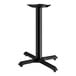 A Lancaster Table & Seating black metal table base with a cross-shaped bottom.
