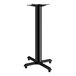A Lancaster Table & Seating black cast iron bar height table base with a cylindrical pedestal.
