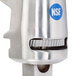 An Edlund stainless steel manual can opener with an adjustable bar.