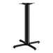A black Lancaster Table & Seating bar height column table base with self-leveling feet.