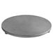 A grey round metal hot plate.