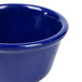 A close-up of a navy blue Thunder Group ramekin.