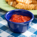 a close up of a red sauce