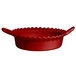 A G.E.T. Enterprises Bugambilia fire red resin-coated aluminum deep Mexican cazuela with wavy edge and handles.