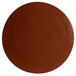 A brown circle with a textured finish.