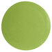 A lime green round disc with a textured surface.