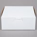 A white box with a white lid.