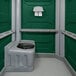 A PolyJohn wheelchair accessible portable restroom with a black seat.