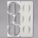 A white plastic Fox Run dumpling maker with circles cut out.