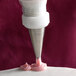 A cake being piped with an Ateco cross-top piping tip.