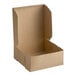 A plain kraft-colored cardboard bakery box with an open lid, measuring 10 inches by 10 inches by 4 inches.