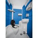 A PolyJohn portable restroom with a blue toilet seat.