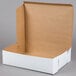 A white half sheet cake box with a lid.