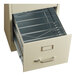 A Hirsh Industries putty vertical file cabinet with two open drawers.