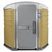 A tan PolyJohn wheelchair accessible portable toilet with the door open.