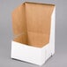 A white cake box with a lid.