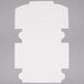A white rectangular piece of paper with a cut out shape in the center.