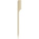 a wooden stick with a white tip
