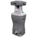 A grey and white PolyJohn Bravo heated portable dual hand washing station with a lid.