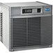A grey rectangular Follett Maestro Plus air cooled ice machine with a vent.