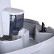 A PolyJohn Bravo portable dual hand washing station with a white soap dispenser with a clear plastic lid.