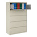 A five-drawer putty-colored lateral file cabinet with a roll-out binder storage shelf containing assorted binders.