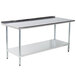 A stainless steel Advance Tabco work table with a galvanized undershelf.