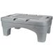 A grey plastic Continental bow tie dunnage rack with holes.