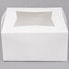 a white box with a curved edge