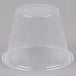 A clear plastic Choice medicine cup with numbers on it.