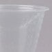 A plastic Choice disposable medicine cup wrapped in plastic.