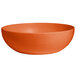 An orange bowl with a white background.