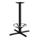 A black cast iron Lancaster Table & Seating bar height table base with a round foot ring.