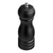 An Acopa matte black wooden salt and pepper mill on a counter.