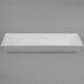 A white rectangular G.E.T. Enterprises Bugambilia deep rectangular platter.