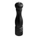 An Acopa matte black wooden salt/pepper mill with a silver tip.