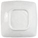 A white square Elite Global Solutions melamine bowl with a blue square center.